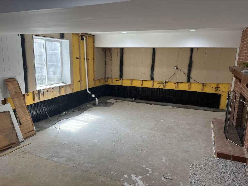 Foundation drainage system redirecting water away from the home